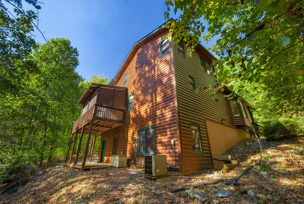 380 Oak Ridge Way Morganton, GA 30560 - Photo 61 of 67 a view of a house with a yard