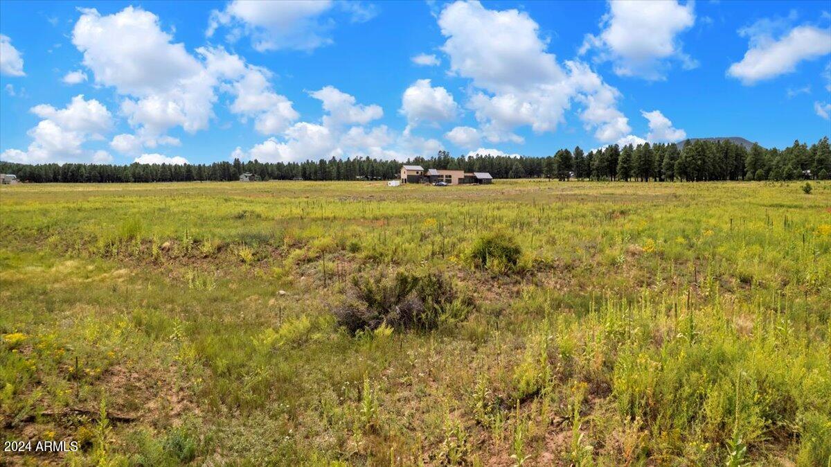 9290 Ranch At The Peaks Way, Unit 12 Flagstaff, AZ 86001 - Photo 13 of 26 a view of a lake view
