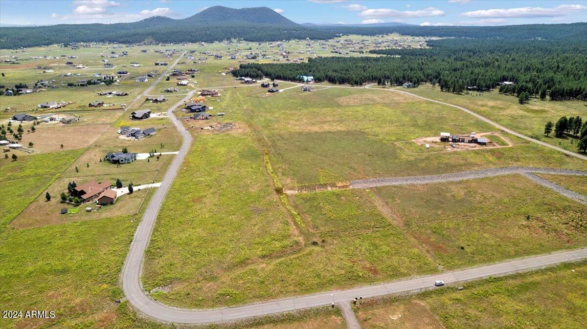 9290 Ranch At The Peaks Way, Unit 12 Flagstaff, AZ 86001 - Photo 8 of 26 a view of swimming pool and mountain view