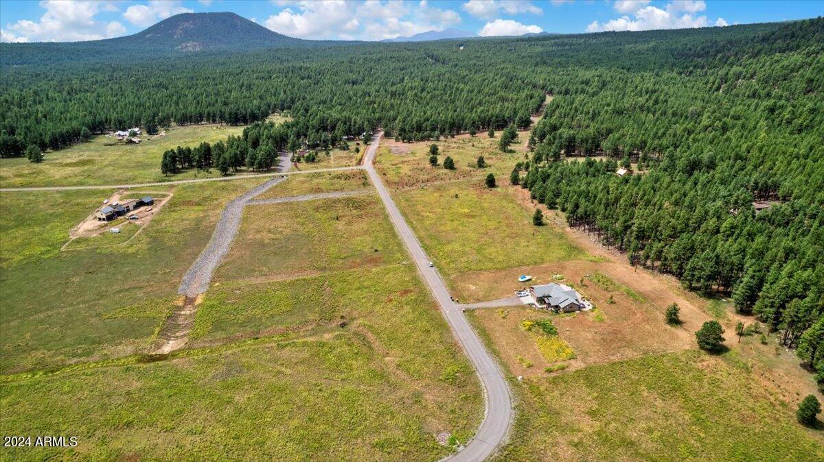 9290 Ranch At The Peaks Way, Unit 12 Flagstaff, AZ 86001 - Photo 9 of 26 a view of swimming pool with a yard