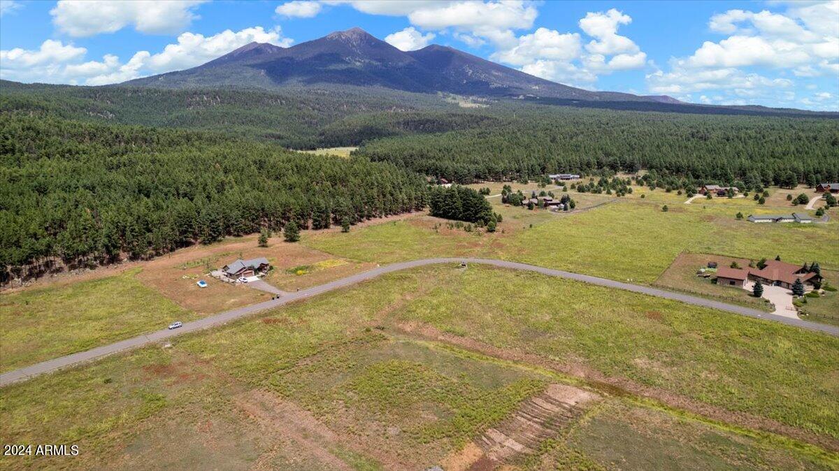 9290 Ranch At The Peaks Way, Unit 12 Flagstaff, AZ 86001 - Photo 10 of 26 a view of a lake in middle of the town