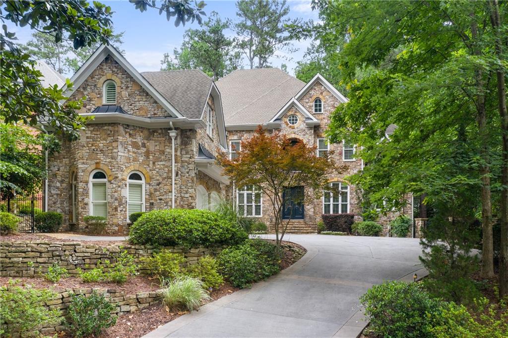 Beautiful 4-sides hand-hewn stone home in wonderful Pine Hills!