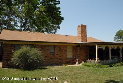 8207 Goodnight Trail Amarillo, TX 79110 - Photo 15 of 16 a front view of a house with a yard