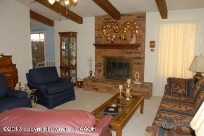 8207 Goodnight Trail Amarillo, TX 79110 - Photo 4 of 16 a living room with furniture and a fireplace