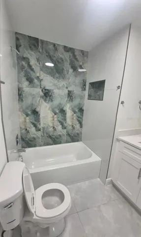 en empty room with fan and window