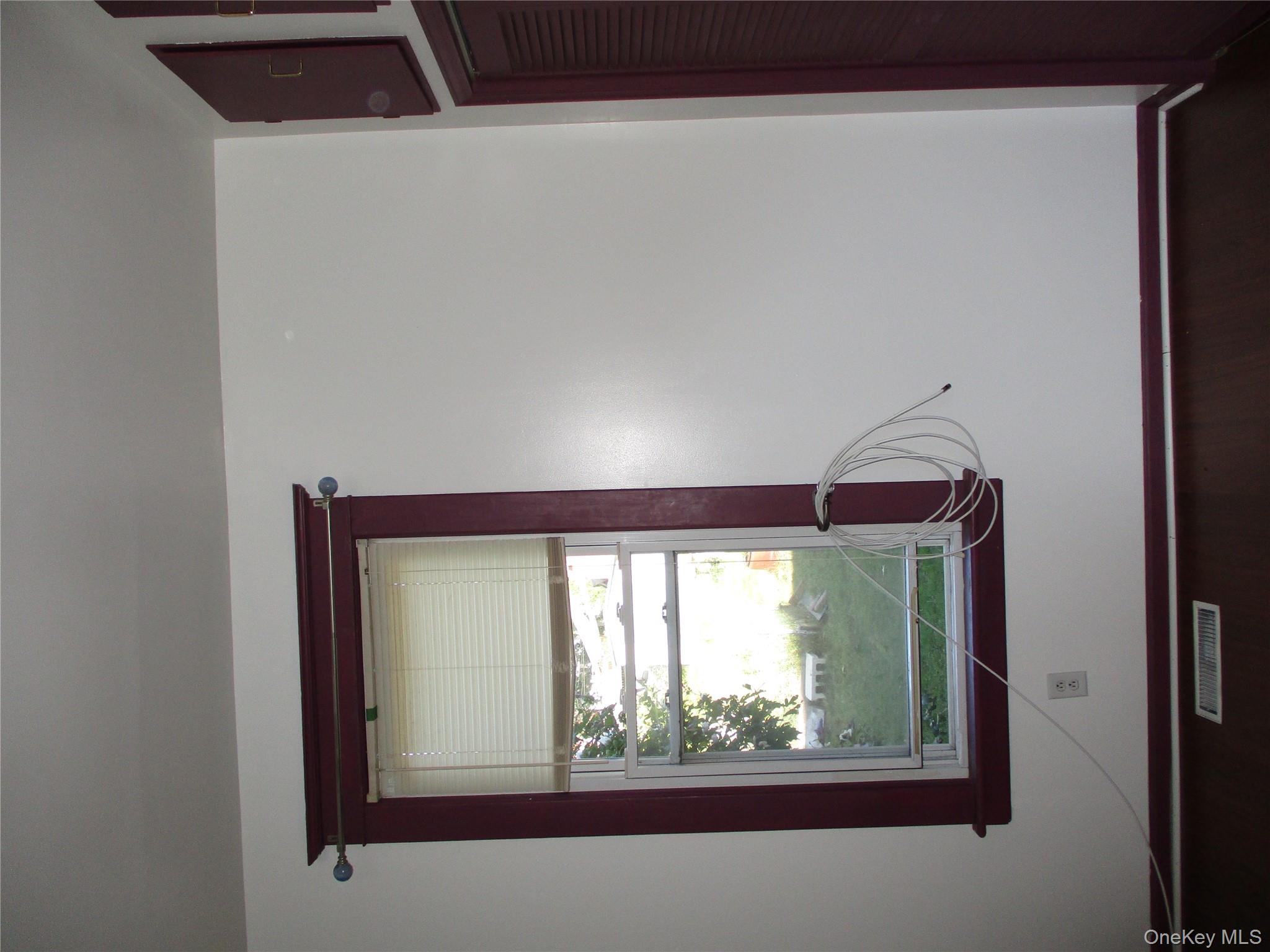 33 Bayview Terrace, Unit 1 Newburgh, NY 12550 - Photo 14 of 20 Detailed view of baseboards and wood finished floors