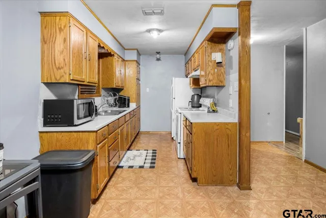 a bathroom with a sink a mirror and a shower