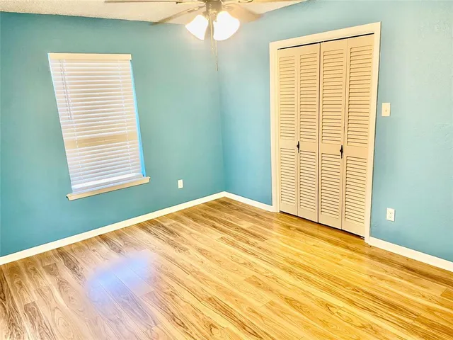 a view of a room with a large window