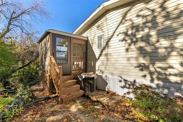 a view of a two chairs in the patio