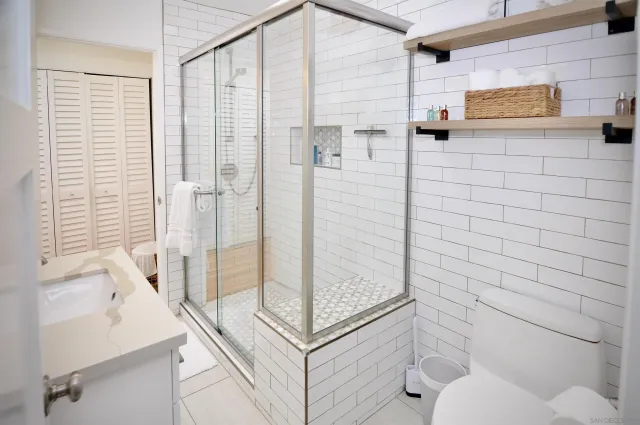 a bathroom with a sink and a shower