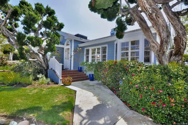 a view of a house with a garden