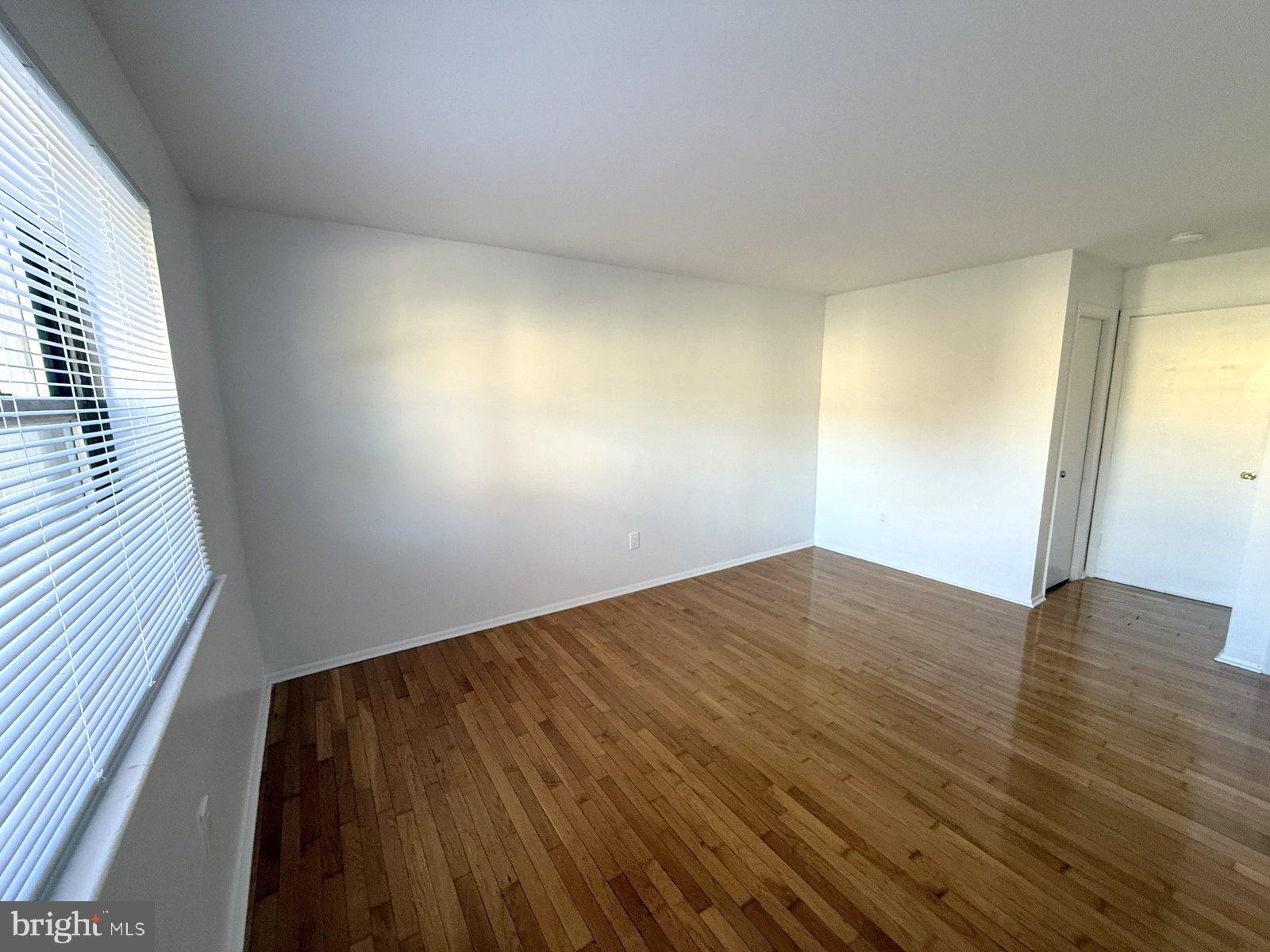 606 Cooper Landing Road, Unit A3E Cherry Hill, NJ 08002 - Photo 13 of 17 a view of empty room with wooden floor