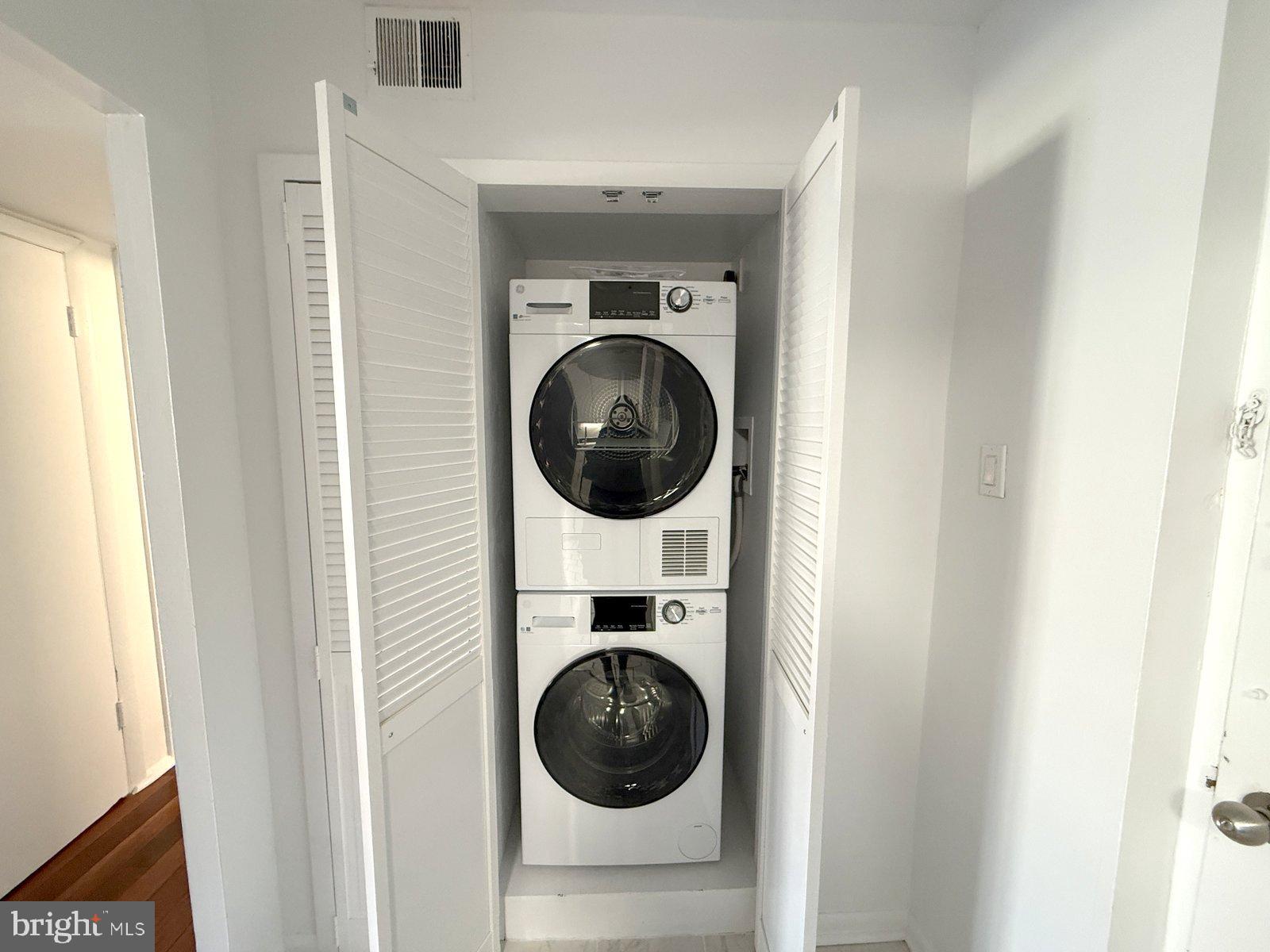 606 Cooper Landing Road, Unit A3E Cherry Hill, NJ 08002 - Photo 15 of 17 a utility room with dryer and washer