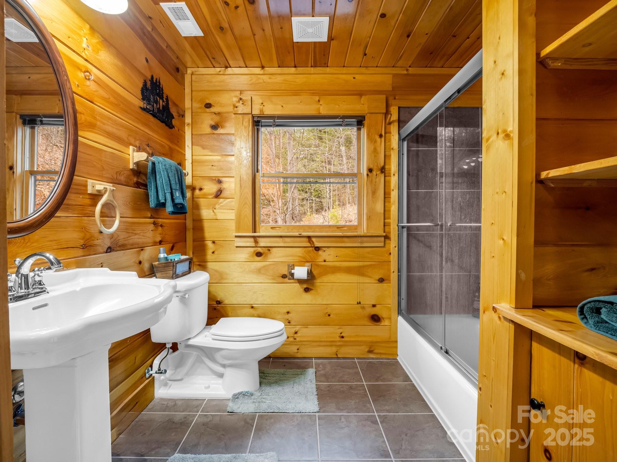 206 Dennis Ridge Bostic, NC 28018 - Photo 28 of 40 a bathroom with a sink toilet and shower