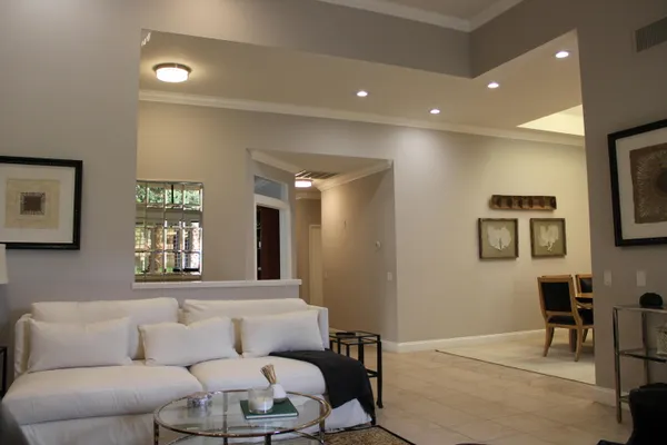 a living room with furniture and a window