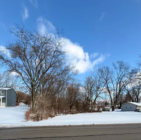 a view of road and trees