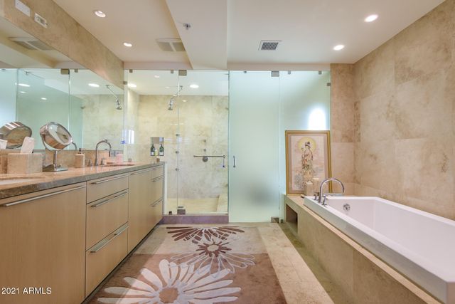 a kitchen with a sink and a refrigerator