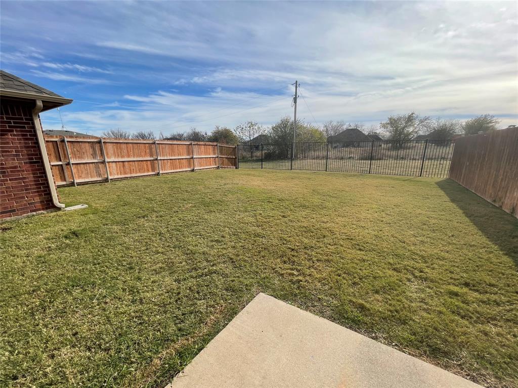 100 Crossbow Court, Unit 102 Weatherford, TX 76088 - Photo 20 of 21 a view of outdoor space and yard