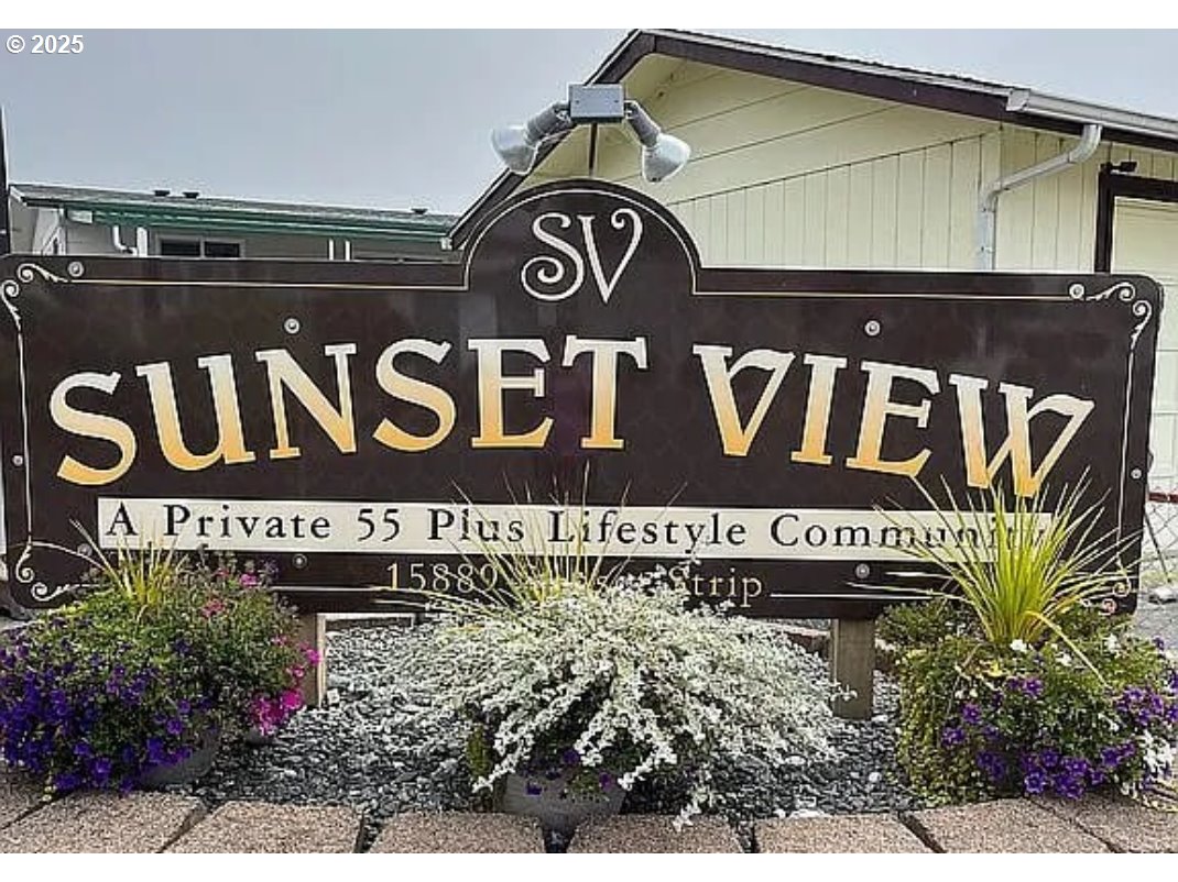 15889 Sunset Strip, Unit 7 Brookings, OR 97415 - Photo 2 of 10 a view of sign board
