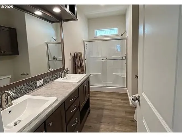a view of deck with wooden floor and chair
