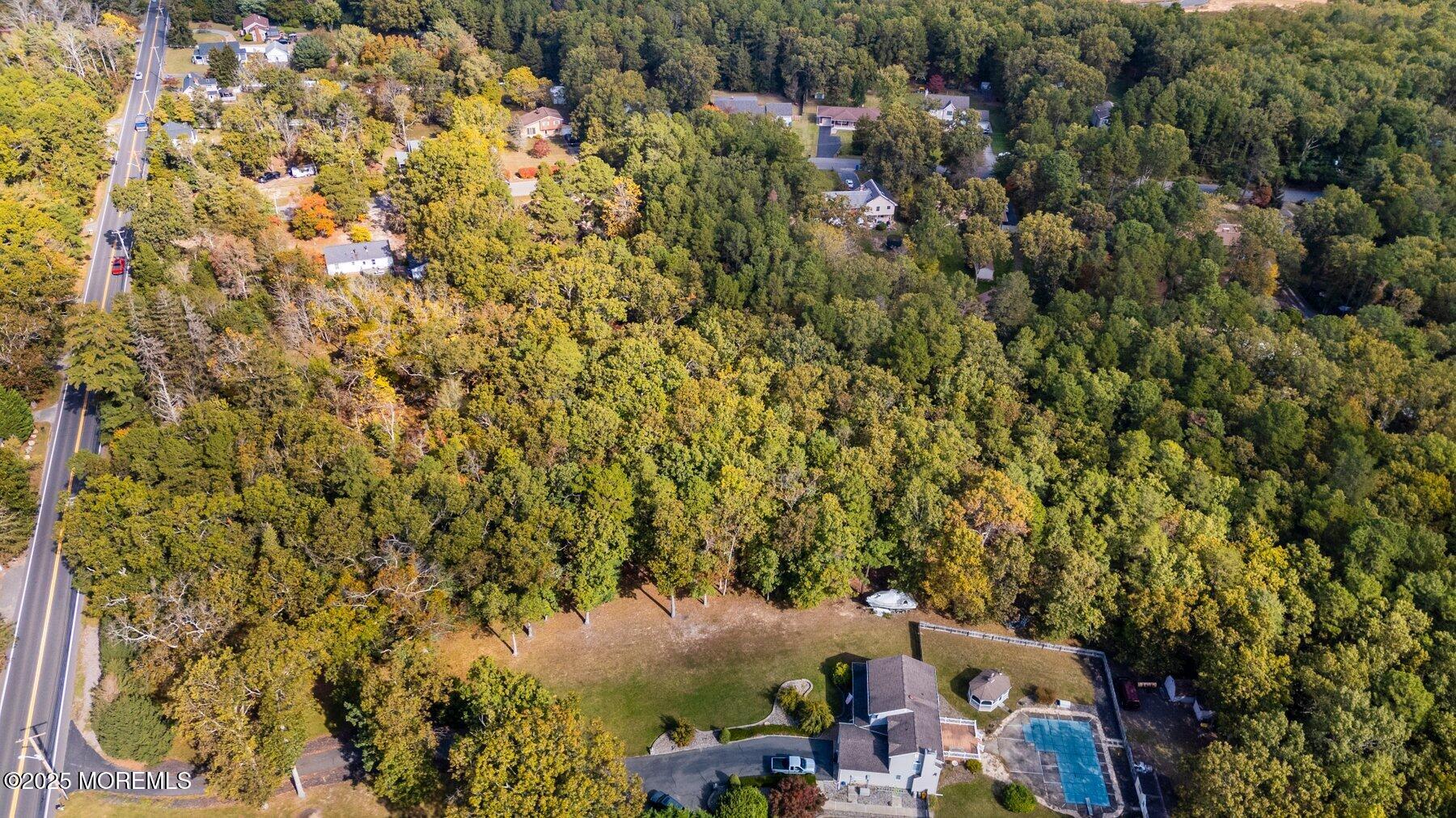 93 Toms River Road Jackson, NJ 08527 - Photo 8 of 12 an aerial view of a houses with yard