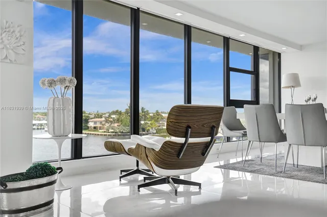 a kitchen with stainless steel appliances a refrigerator sink and cabinets