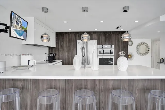 a view of living room with washer and dryer