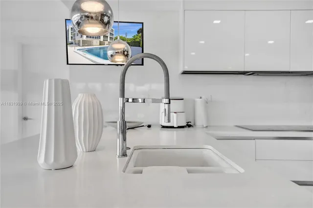 a bedroom with a bed and a cabinets