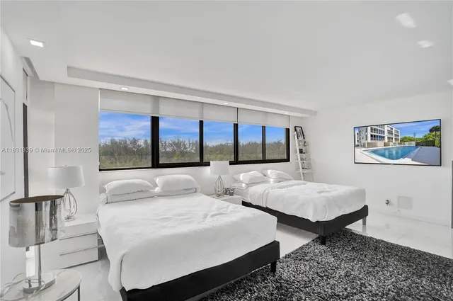 a bathroom with a toilet a sink and a bathtub