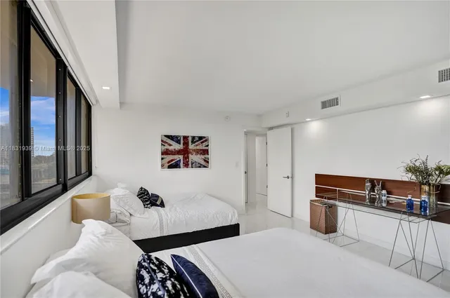 a view of balcony with furniture