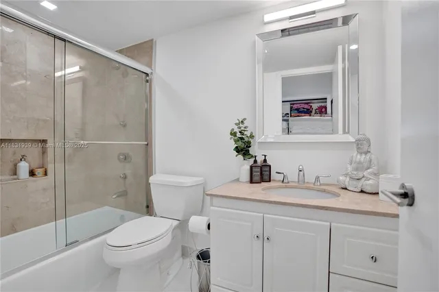 $10,000 | 900 Northeast Spanish River Boulevard, Unit 5C & 5E, Boca Raton, FL 33431