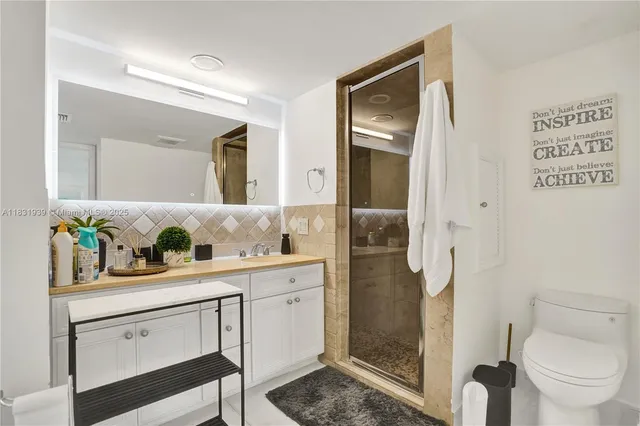 $10,000 | 900 Northeast Spanish River Boulevard, Unit 5C & 5E, Boca Raton, FL 33431