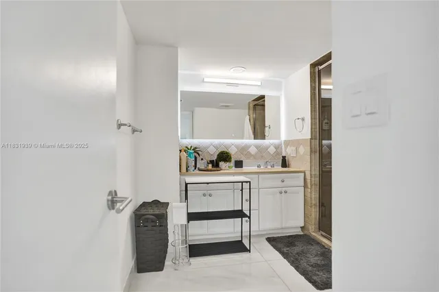 $10,000 | 900 Northeast Spanish River Boulevard, Unit 5C & 5E, Boca Raton, FL 33431