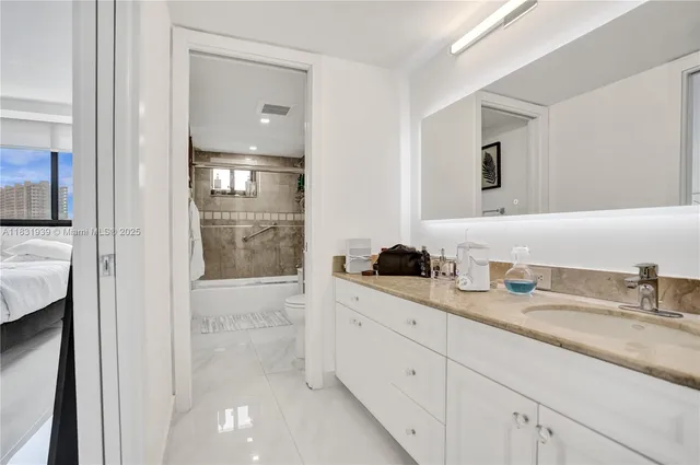 $10,000 | 900 Northeast Spanish River Boulevard, Unit 5C & 5E, Boca Raton, FL 33431