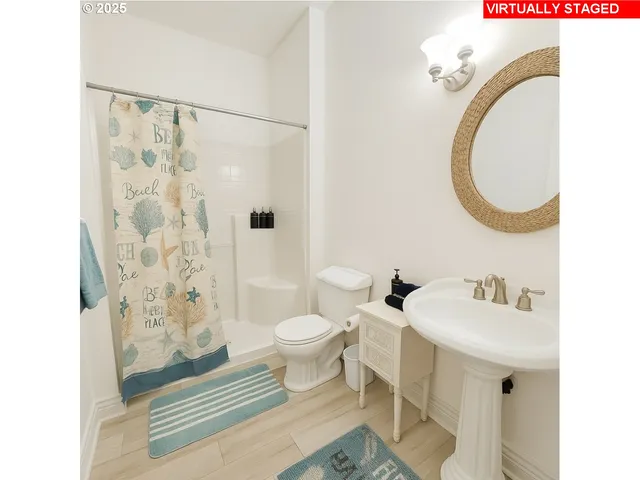 a bedroom with a bed window and dresser