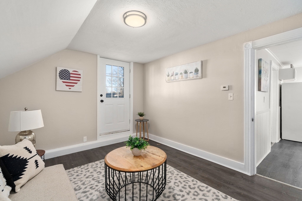 27 Dresser Street Webster, MA 01570 - Photo 17 of 33 a room with furniture and a table