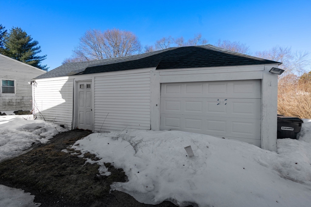 27 Dresser Street Webster, MA 01570 - Photo 2 of 33 a black and white house with a outdoor space