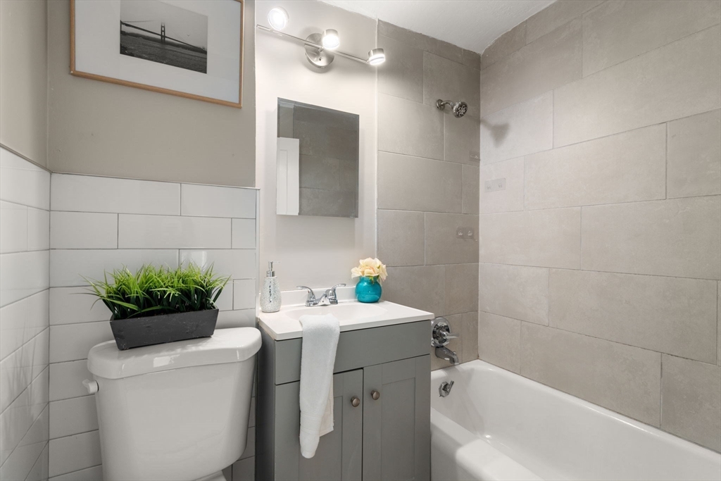 27 Dresser Street Webster, MA 01570 - Photo 23 of 33 a bathroom with a sink toilet and shower