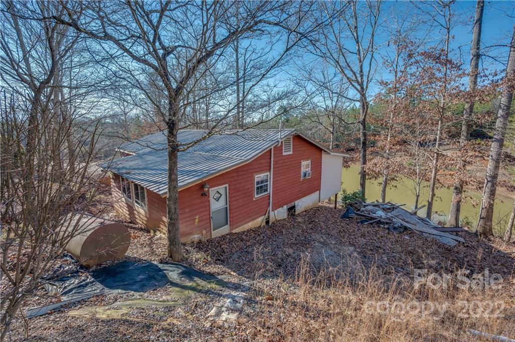 380 Happy Lane Rutherfordton, NC 28139 - Photo 18 of 45 a view of a house with a yard