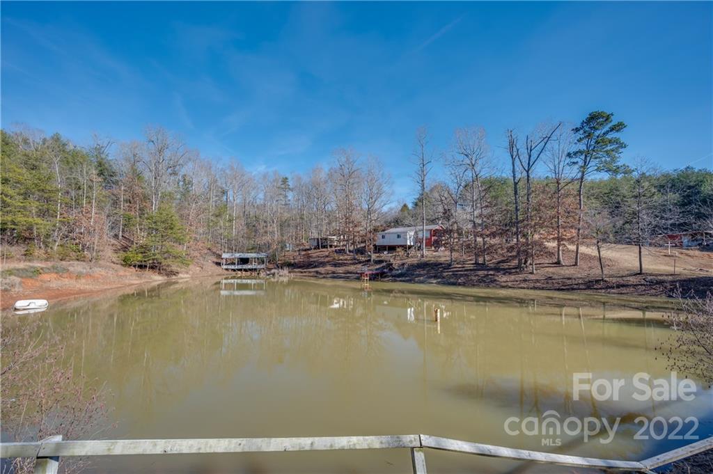 380 Happy Lane Rutherfordton, NC 28139 - Photo 2 of 45 a view of a lake with houses
