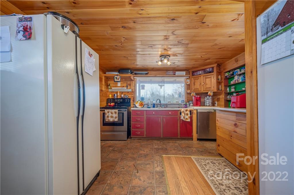 380 Happy Lane Rutherfordton, NC 28139 - Photo 24 of 45 a kitchen with refrigerator and window