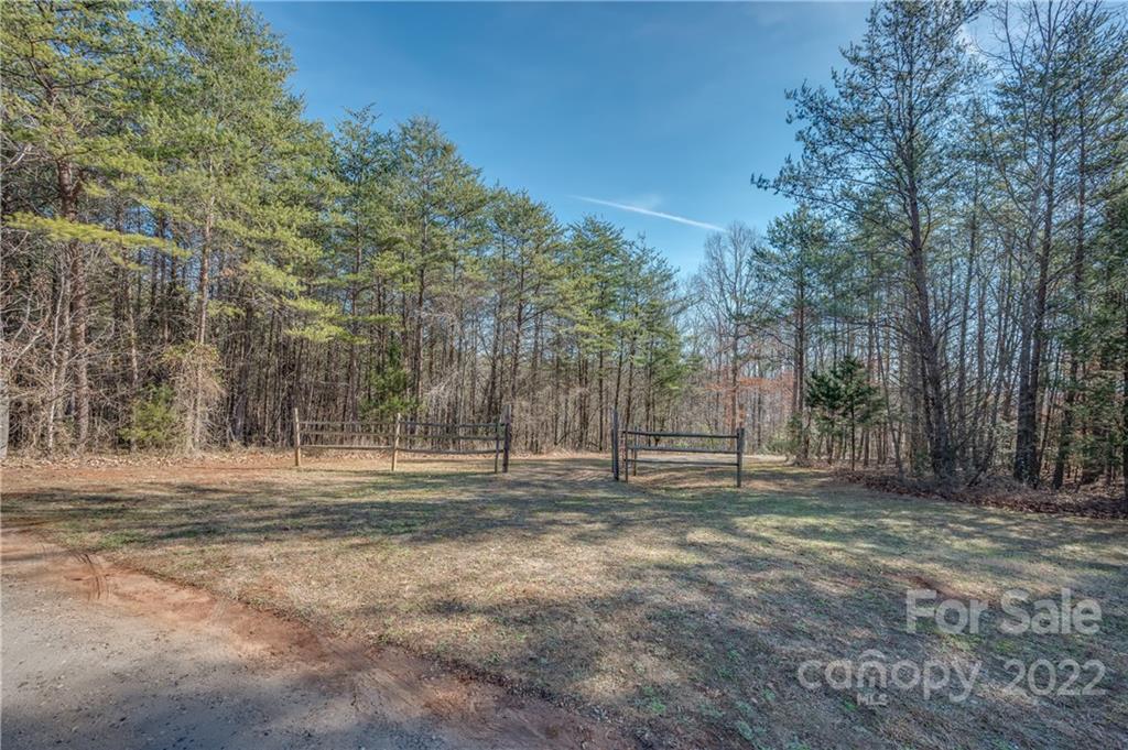 380 Happy Lane Rutherfordton, NC 28139 - Photo 42 of 45 a backyard of a house with lots of green space