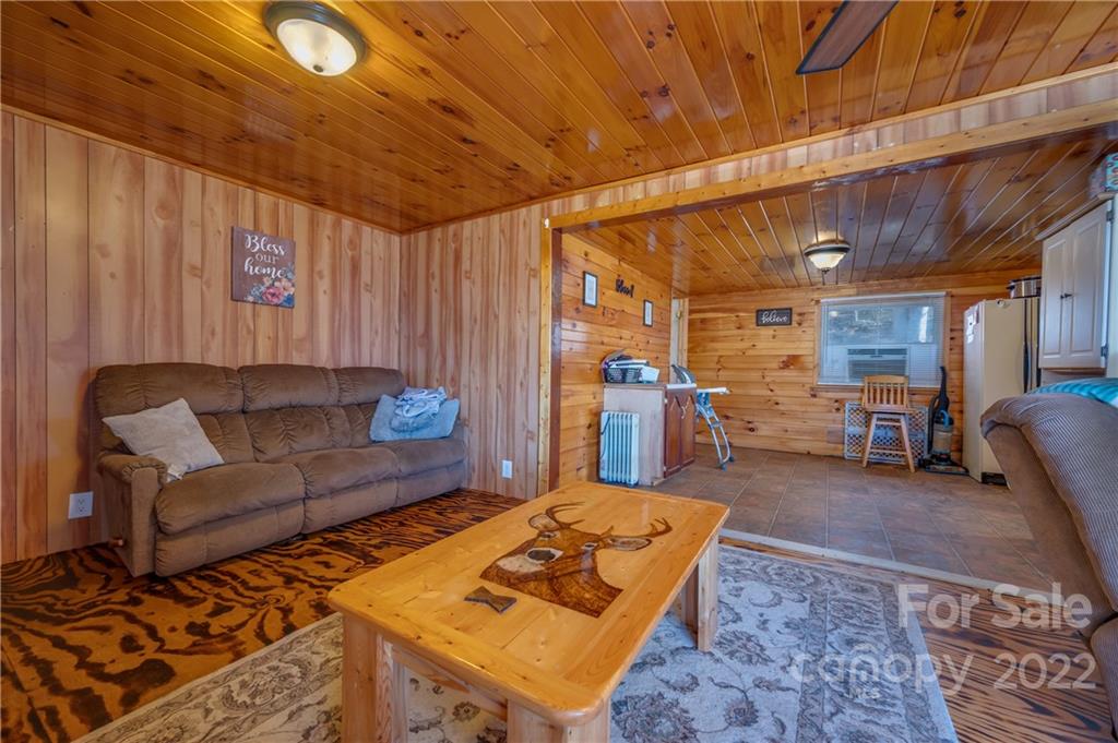380 Happy Lane Rutherfordton, NC 28139 - Photo 8 of 45 a living room with furniture and a table