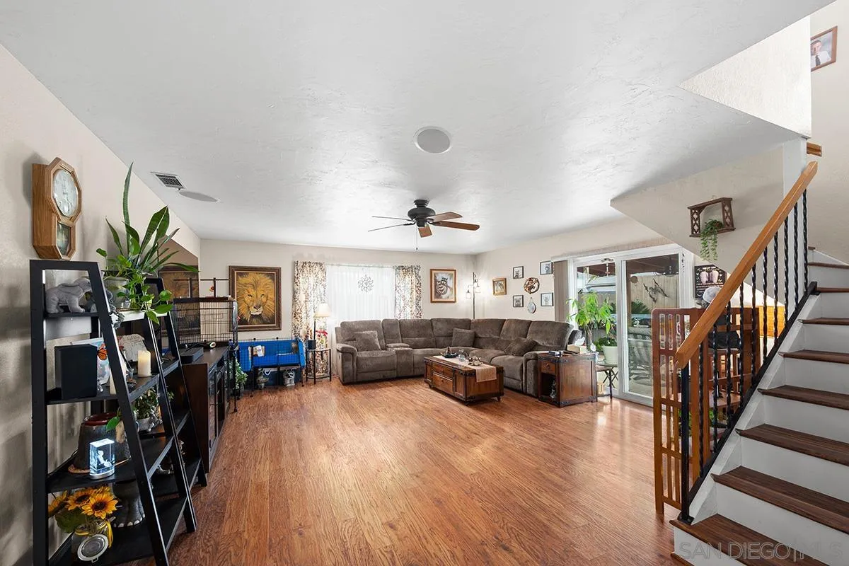 9948 Kincaid Street Santee, CA 92071 - Photo 15 of 53 a living room with furniture and a large window