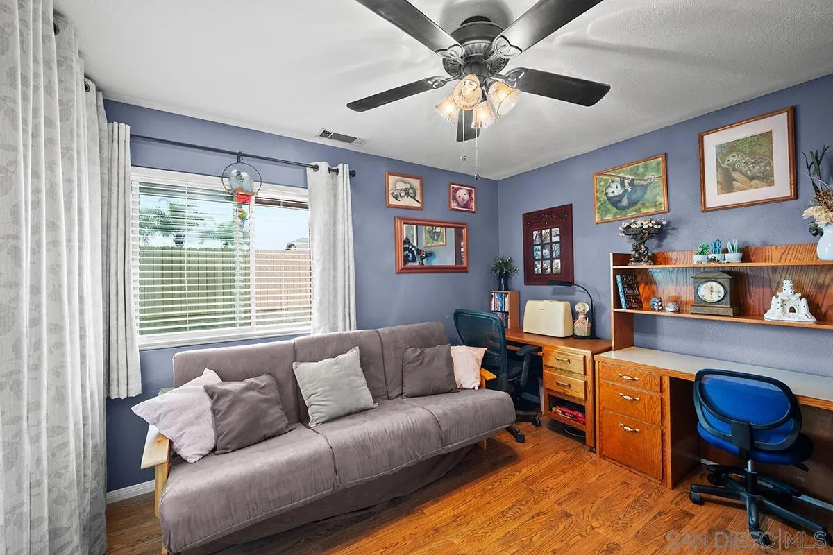 9948 Kincaid Street Santee, CA 92071 - Photo 22 of 53 a view of a livingroom with workspace and a window