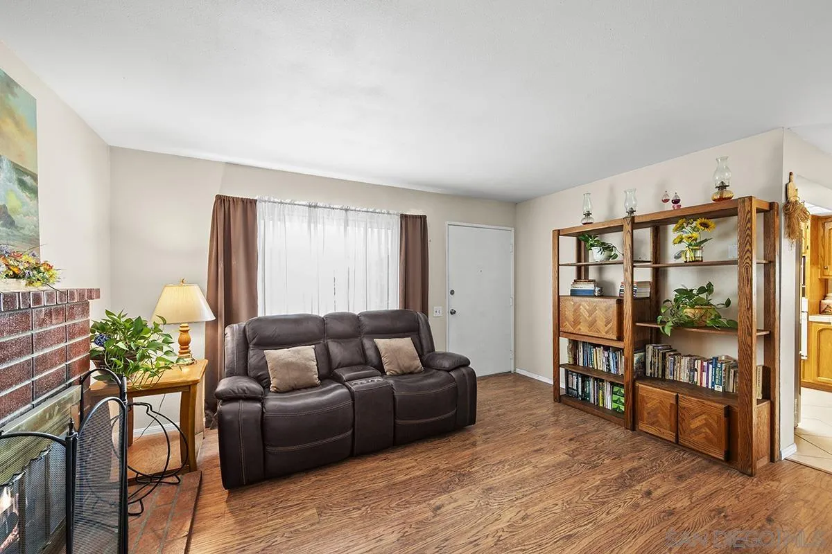 9948 Kincaid Street Santee, CA 92071 - Photo 6 of 53 a living room with furniture and wooden floor