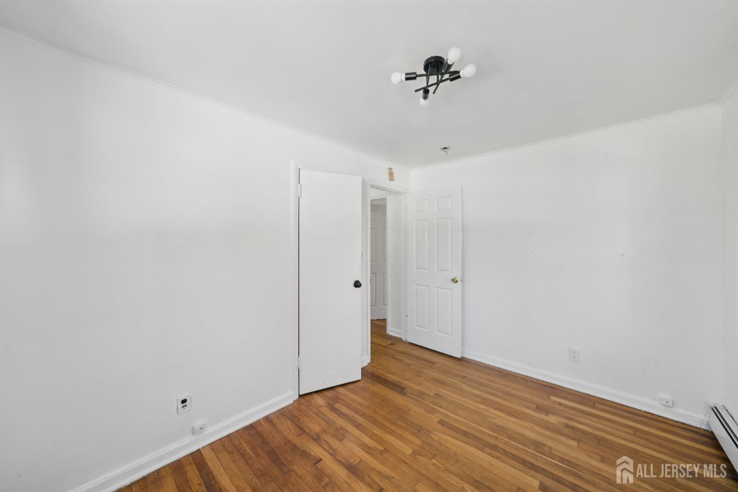 94 South Hill Road Colonia, NJ 07067 - Photo 17 of 31 a view of an empty room