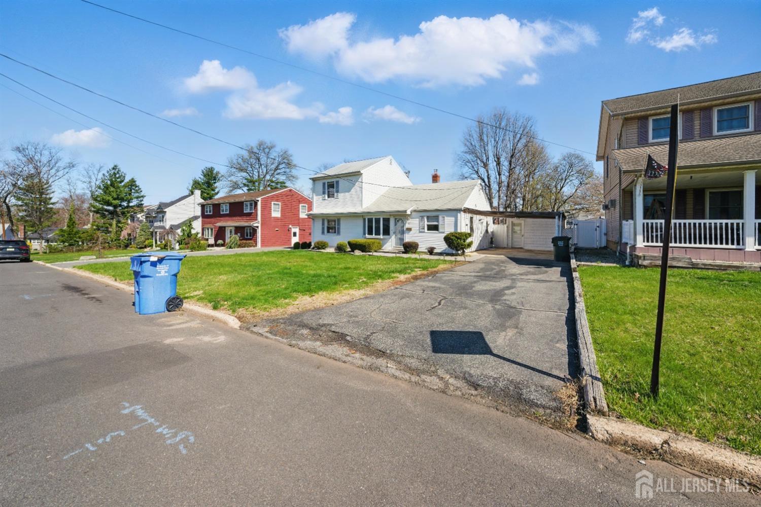 94 South Hill Road Colonia, NJ 07067 - Photo 2 of 31 a front view of house with yard