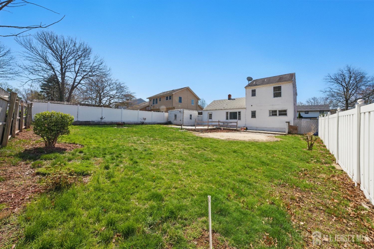 94 South Hill Road Colonia, NJ 07067 - Photo 27 of 31 a view of a house with a yard and sitting area