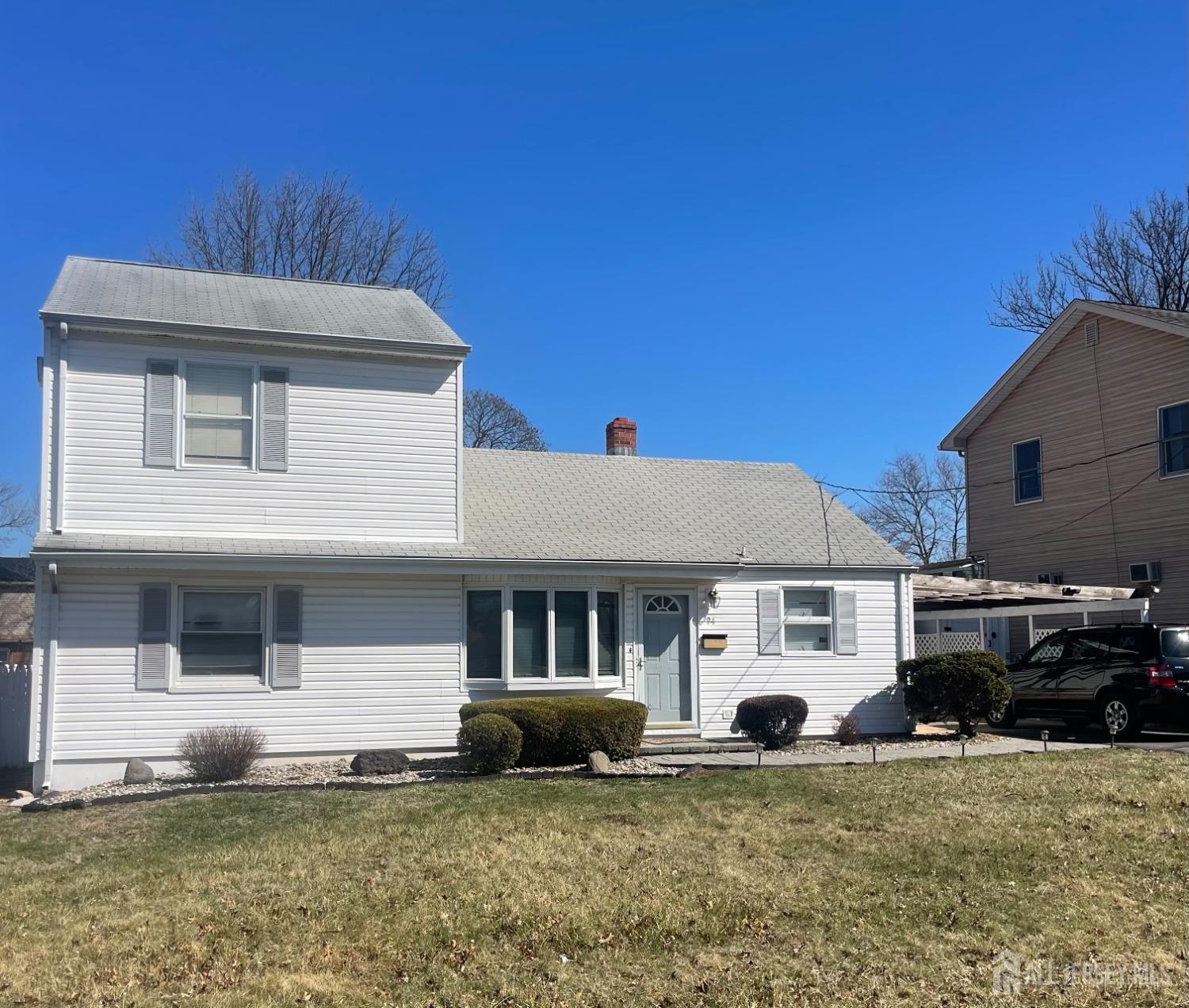 94 South Hill Road Colonia, NJ 07067 - Photo 3 of 31 a front view of a house with a garden